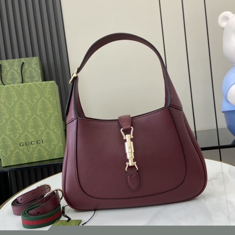 G*u*i top handle bags
